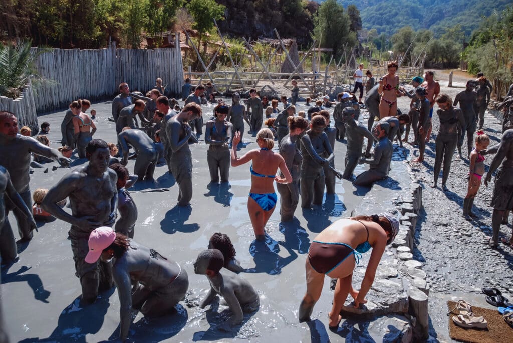 Dalyan, Turkey - Visitors enjoy the mud baths near Dalyan town of Mugla Province