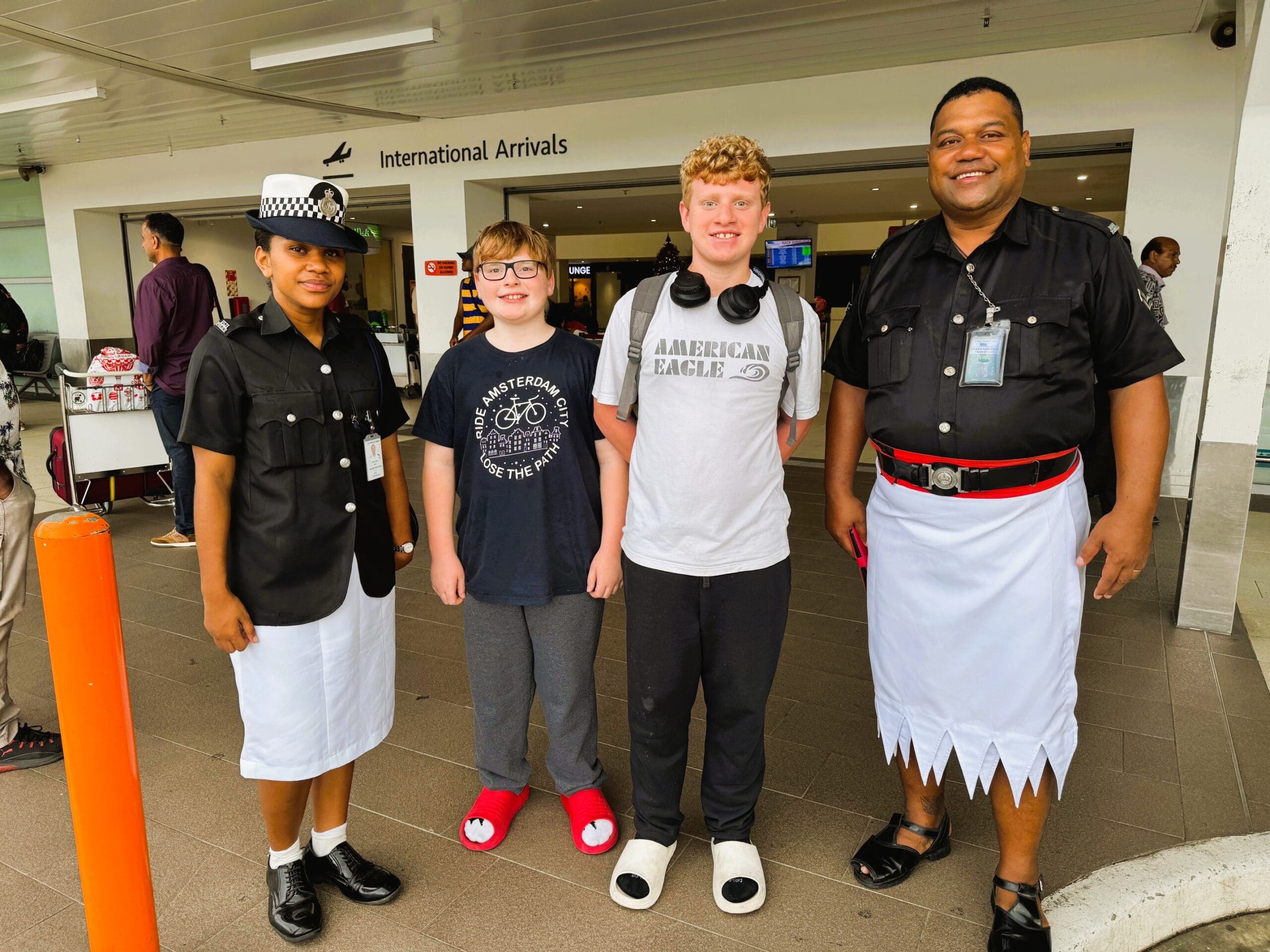 Hiding Your Nationality While Traveling: My well-traveled sons arriving in Fiji