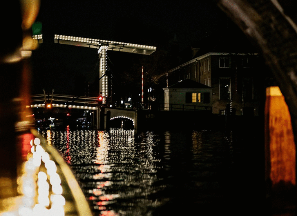 Wine and cheese tasting aboard small-group amsterdam evening canal cruise with sommelier guide and artisanal Dutch selections