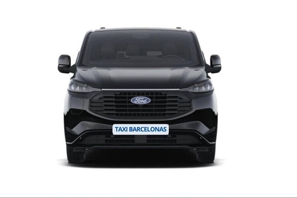 Professional Barcelona airport transfer driver waiting with name sign in El Prat arrivals hall for city center pickup