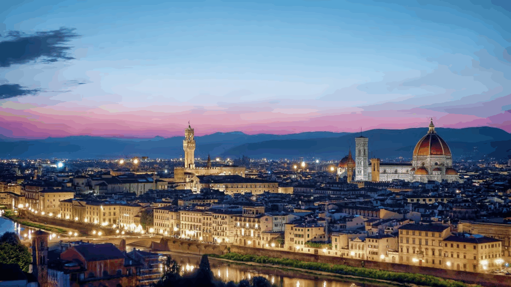 Evening Florence walking tour with illuminated monuments and couples exploring the historic center at sunset