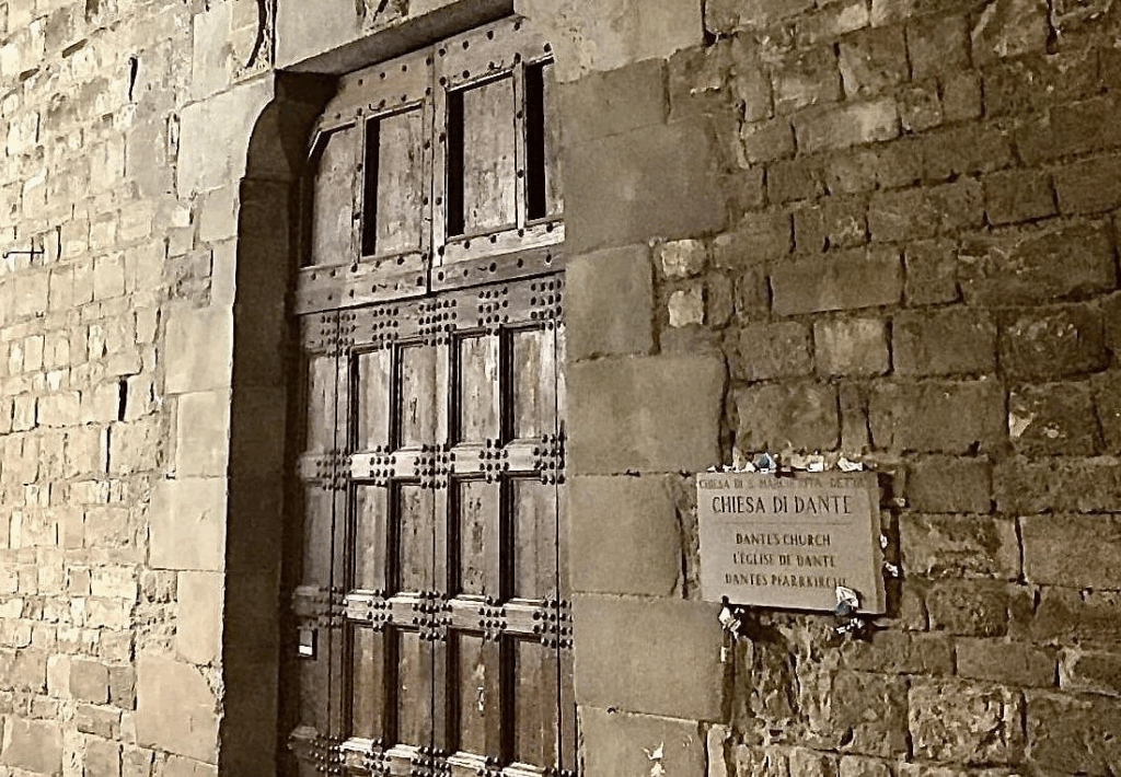 Dark legends Florence walking tour group exploring shadowy medieval streets during atmospheric evening tour