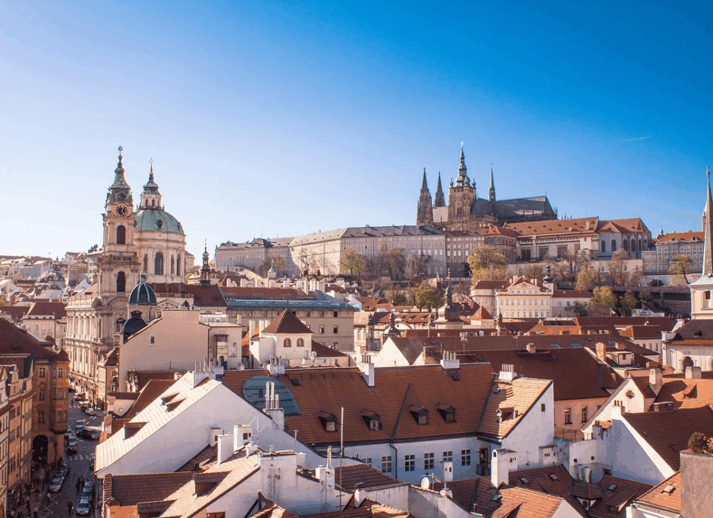 Afternoon walking tour exploring Prague Castle's magnificent courtyards with St. Vitus Cathedral towering overhead