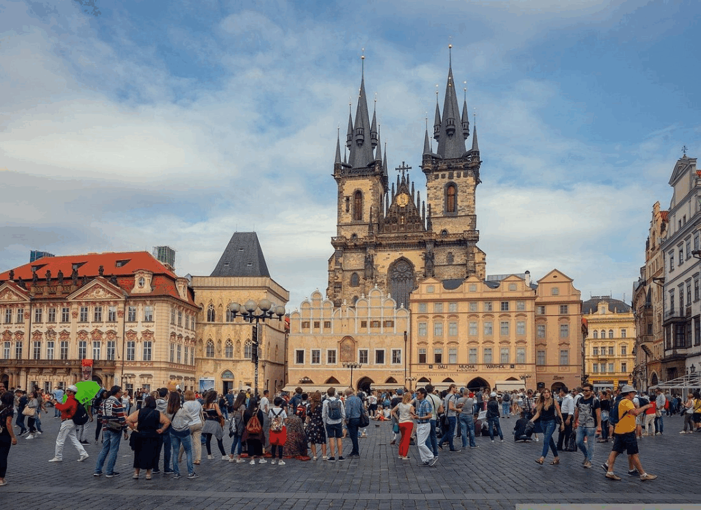 Private tour guide showing couple the best viewpoints across both riverbanks of Prague's historic centre