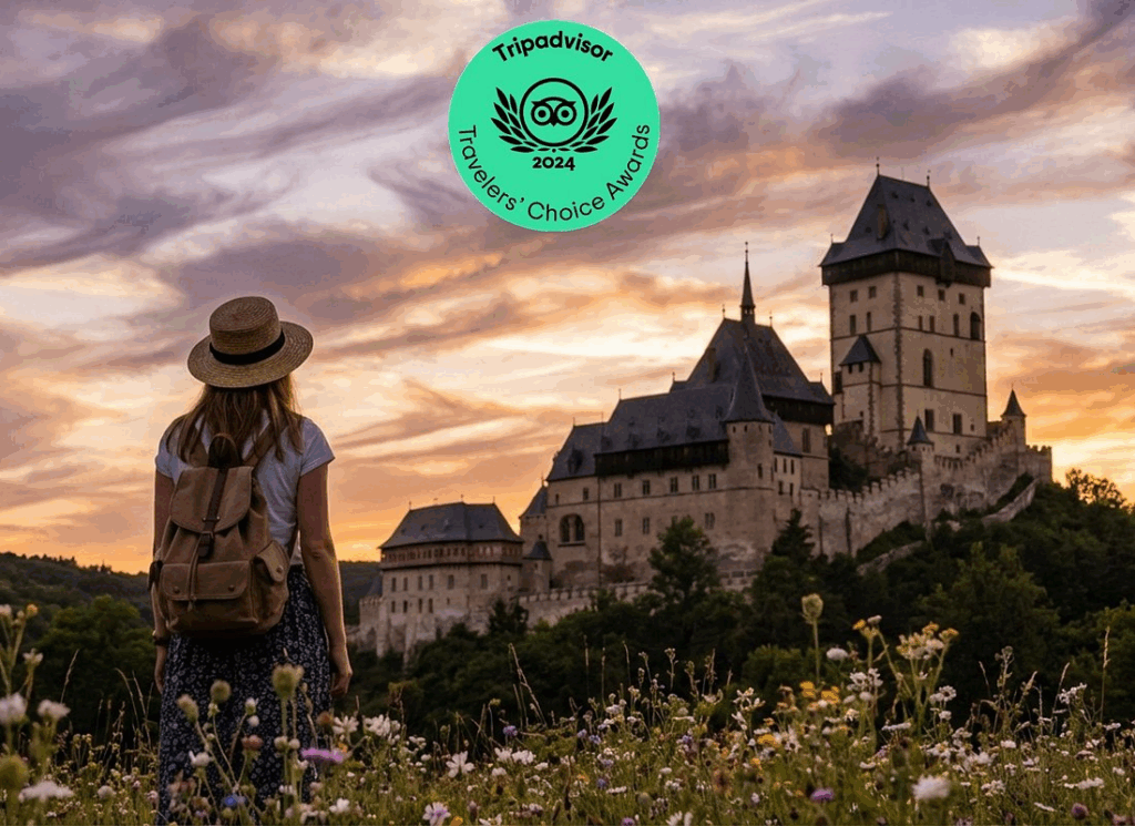 Day trips from Prague to Karlštejn Castle, with a traveler overlooking the medieval fortress at sunset
