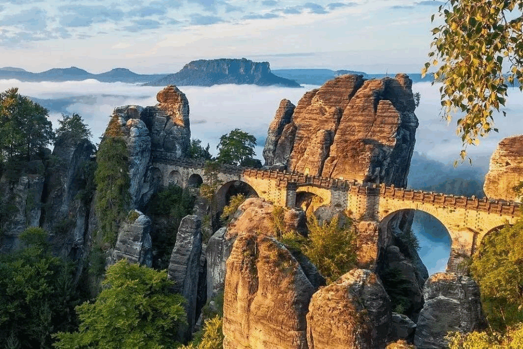 Day trips from Prague featuring afternoon view of Bastei Bridge spanning Elbe River canyon