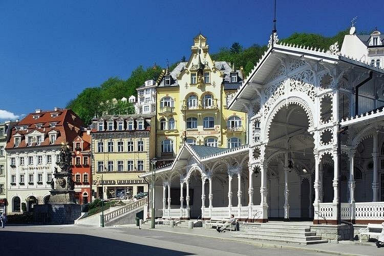 Day trips from Prague to Karlovy Vary, showing the elegant spa colonnades and historic buildings