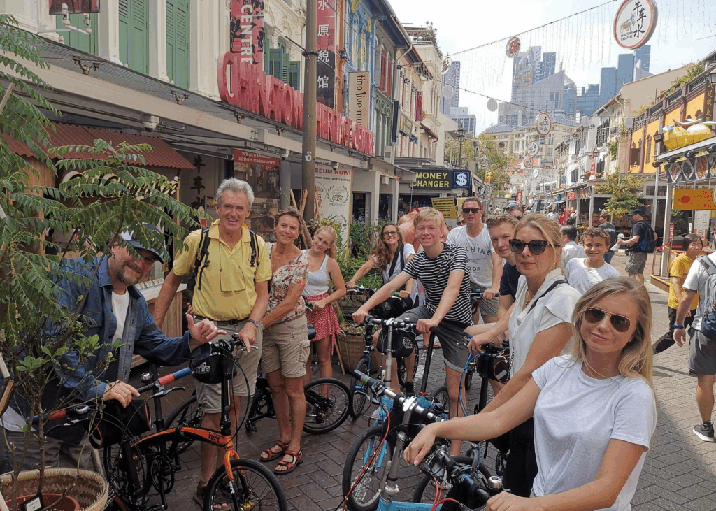City bike tours in Singapore showing cyclists riding park connector paths and modern waterfront routes