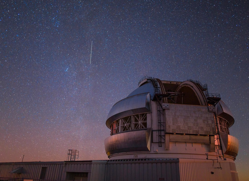 Mauna Kea’s summit observatory sits beneath a dazzling, star-filled sky often experienced on mauna kea stargazing tours, where visitors explore one of the world’s premier astronomy destinations in Hawaii